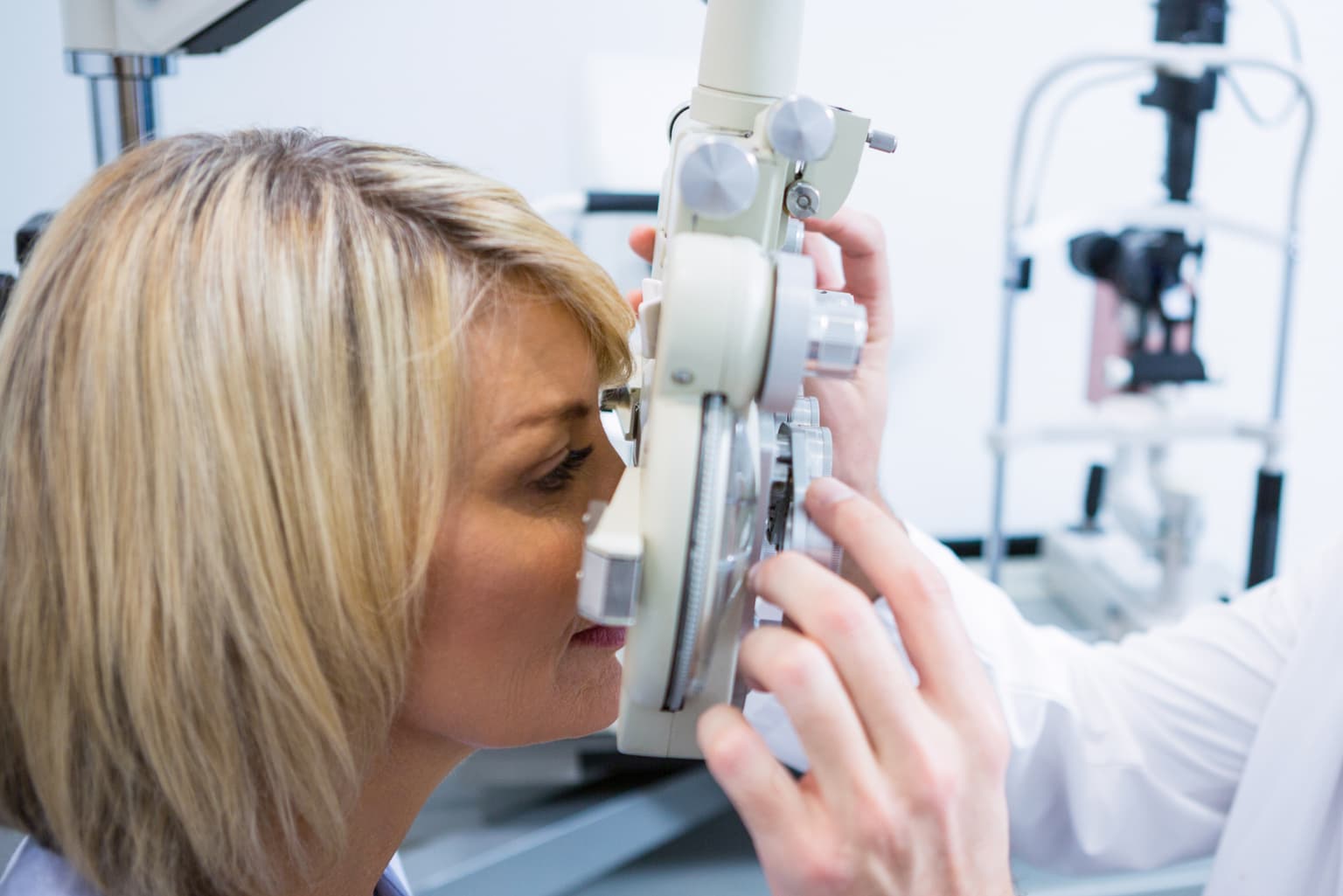 Adult in their forties working comfortably without reading glasses after laser vision correction
