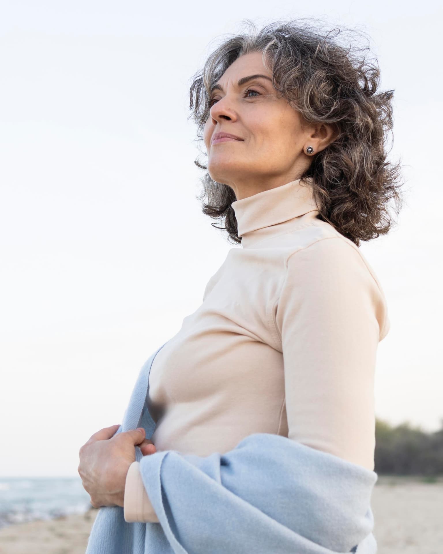 Patient enjoying clear vision outdoors without glasses after treatment at The Eye Doctor Clinic